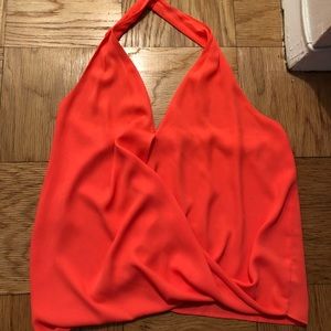 Bright orange halter top